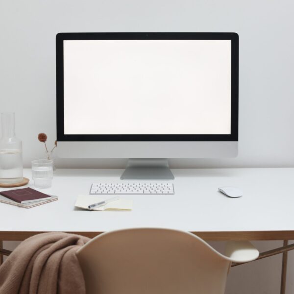 Free Stylish workspace with computer and simple furniture Stock Photo